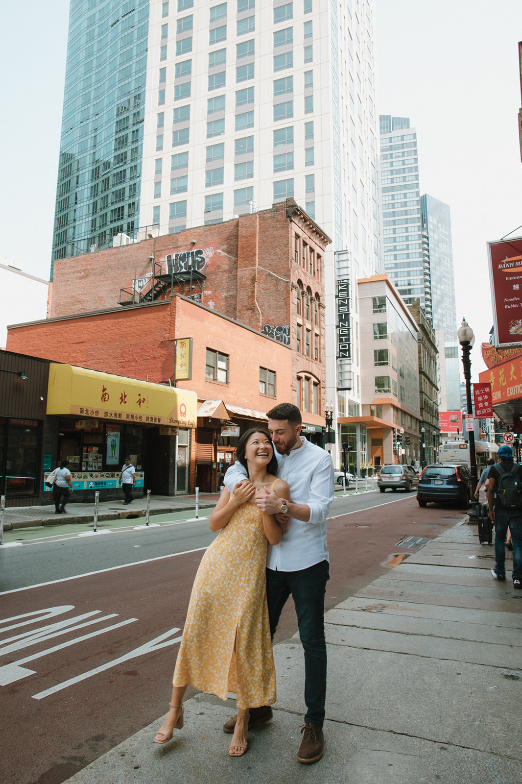 Stunning couple pose in historic chinatown during their Boston engagement photos! 