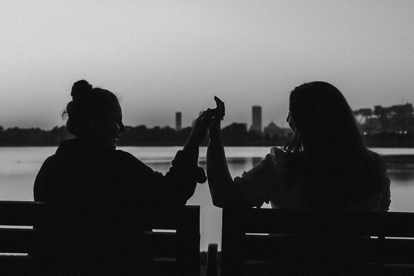 A dreamy couple holding hand during their Boston engagement.