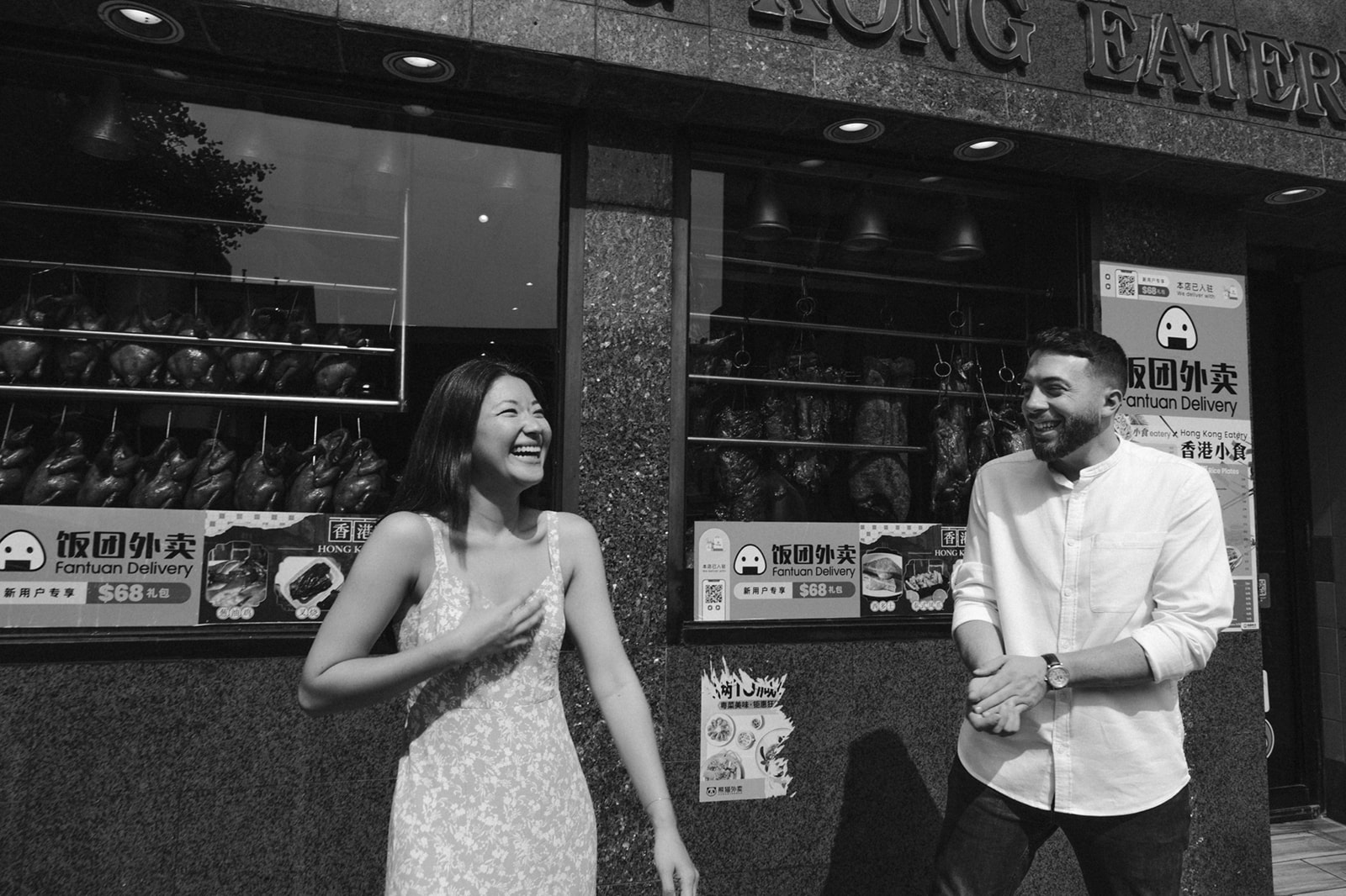 Beautiful bride and groom takes a candid and natural photo during Boston engagement photos 