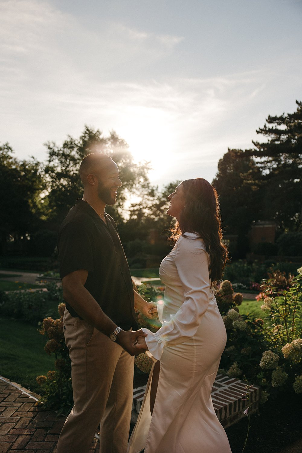 candid couple engagement photos during golden hour in Boston