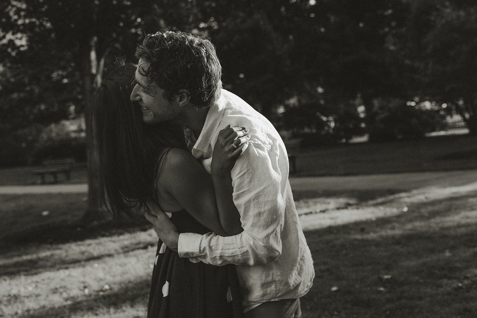 Couple laugh, smile and have fun during their Boston engagement photoshoot