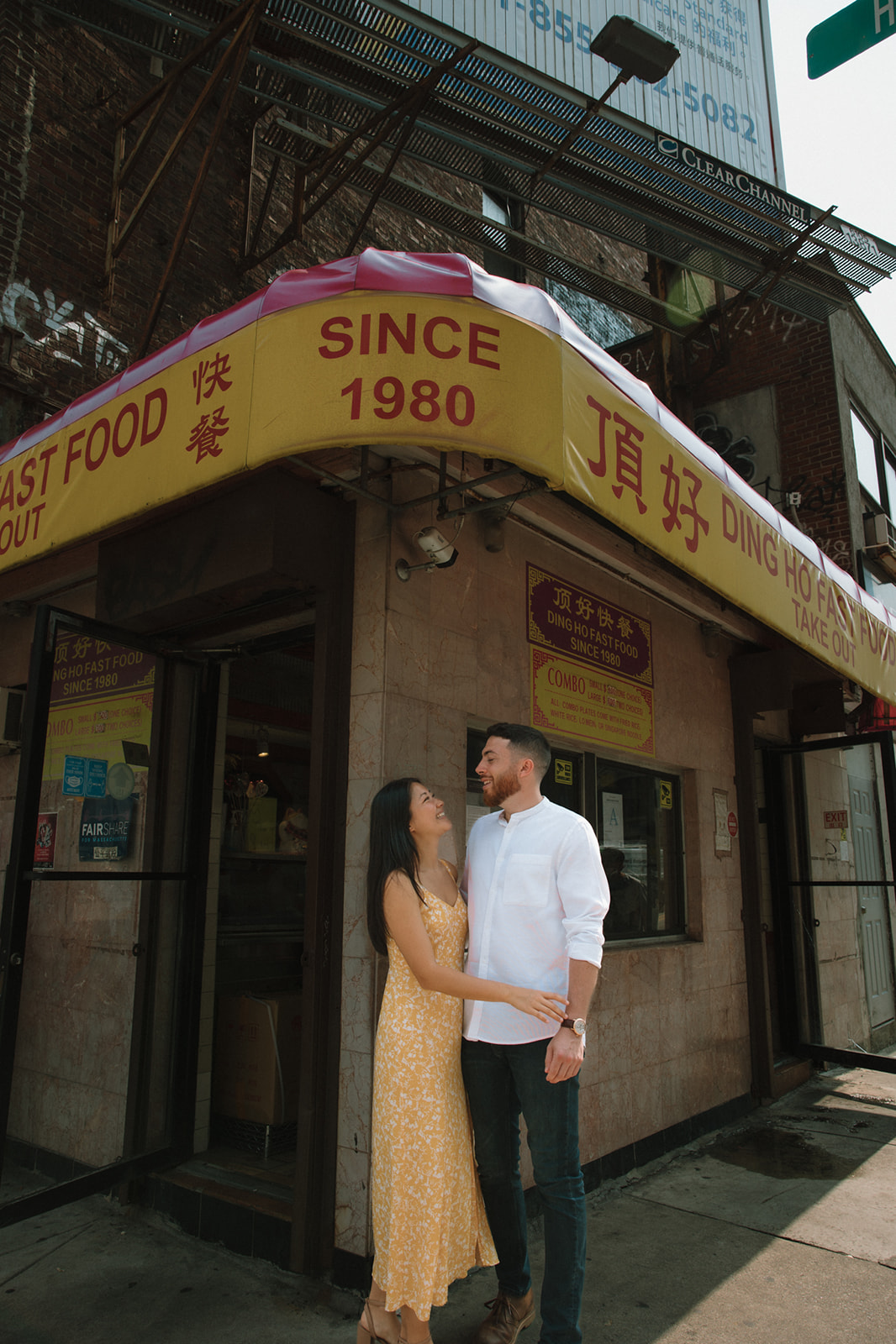 Couple pose in historic chinatown during their Boston engagement photos!