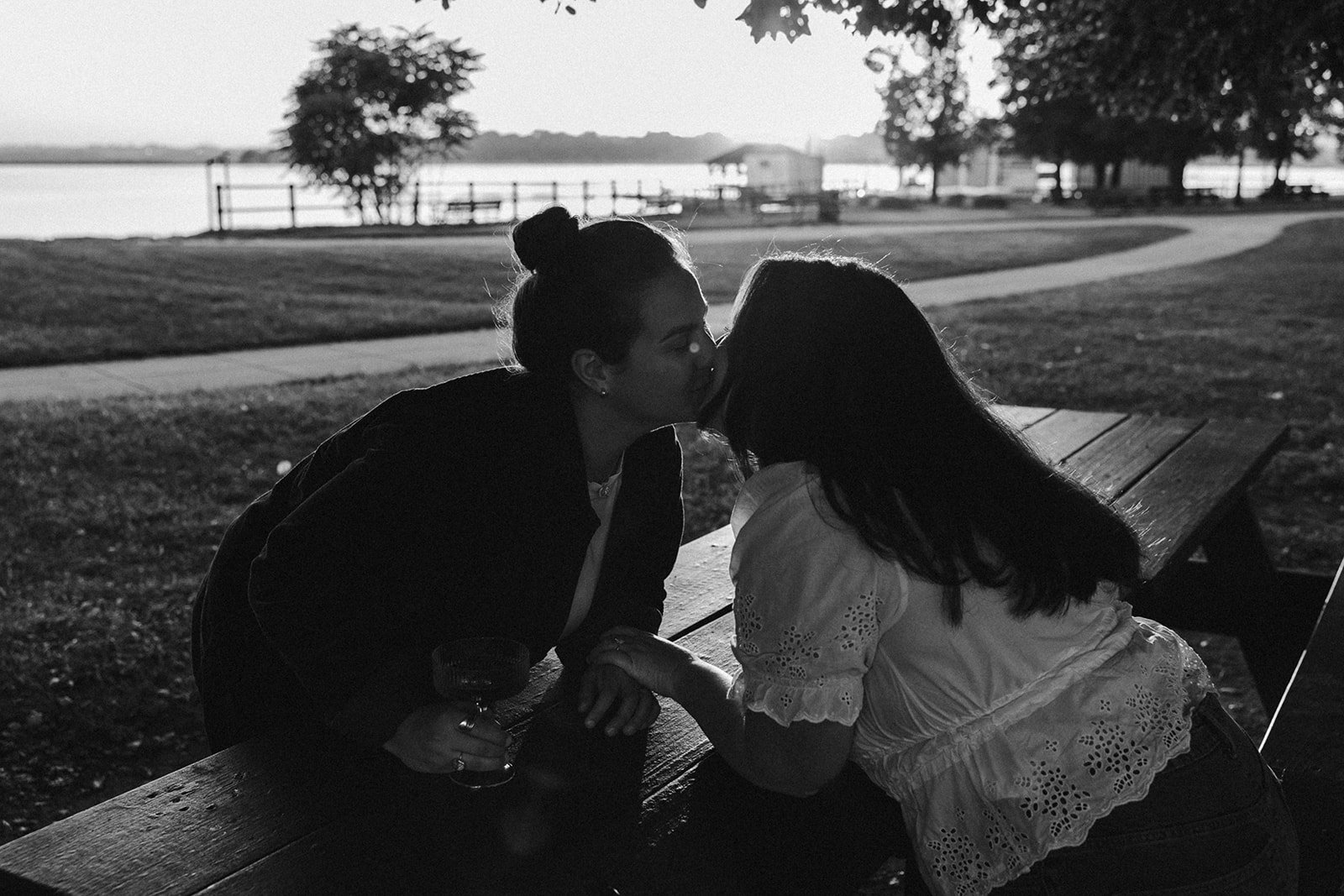 A beautiful couple kisses during their Castle Island engagement photos!