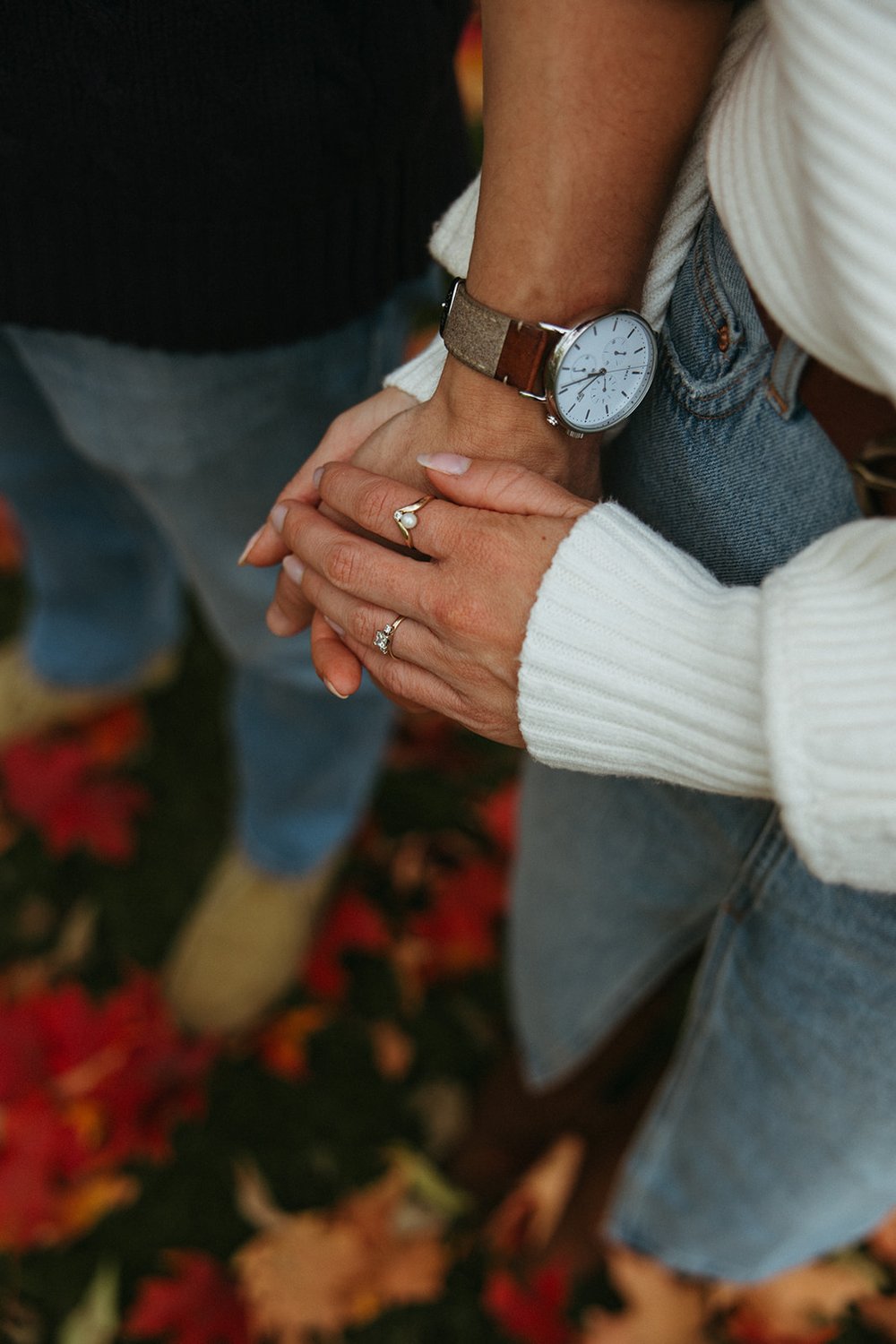 Stunning couple pose together highlighting the engagement ring!