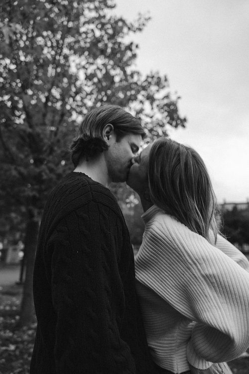 boston couple kiss during their cambridge engagement photoshoot