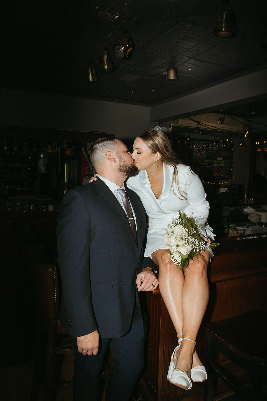 Stunning bride and groom share a kiss after eloping in Massachusetts