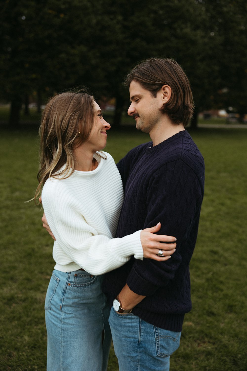 Stunning couple pose together  during their Boston engagement photos