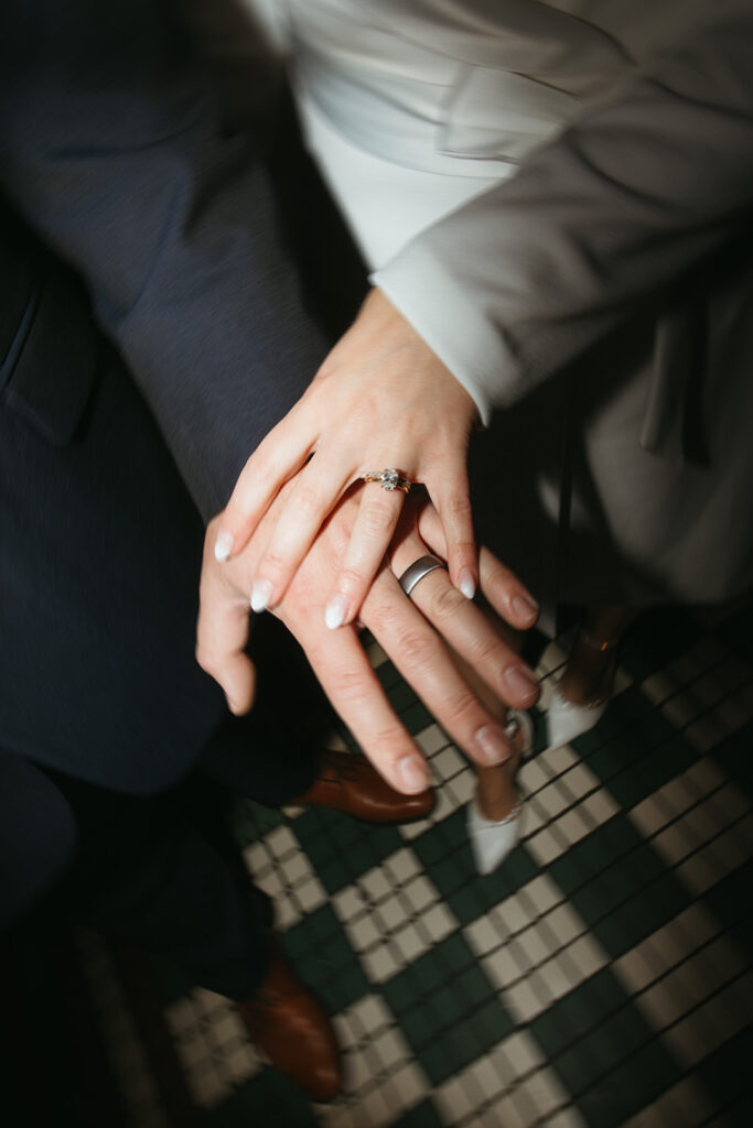 Bride and groom show off their new bling after their dreamy elopement day