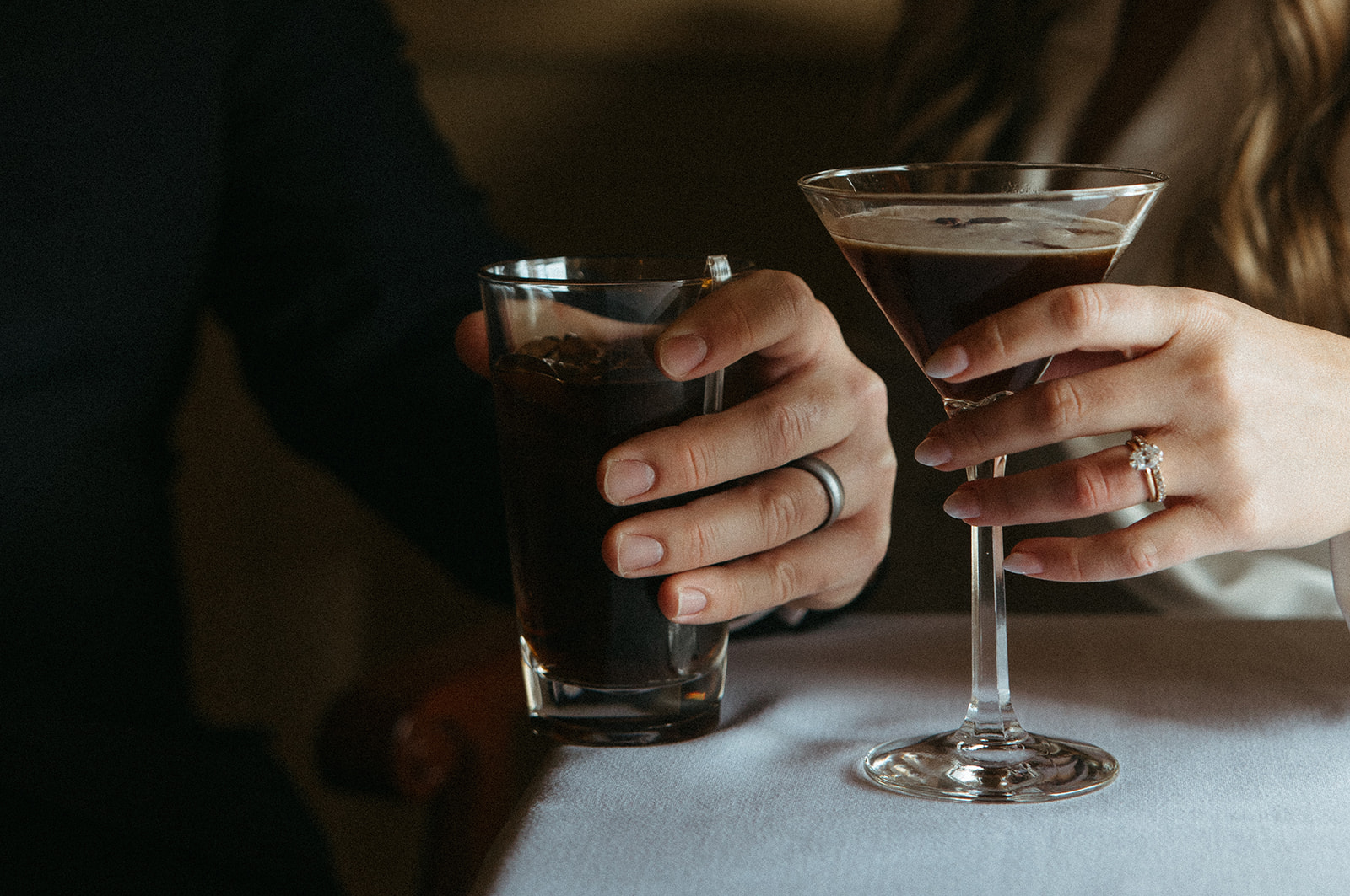 Stunning bride and groom share cocktails together after their elopement