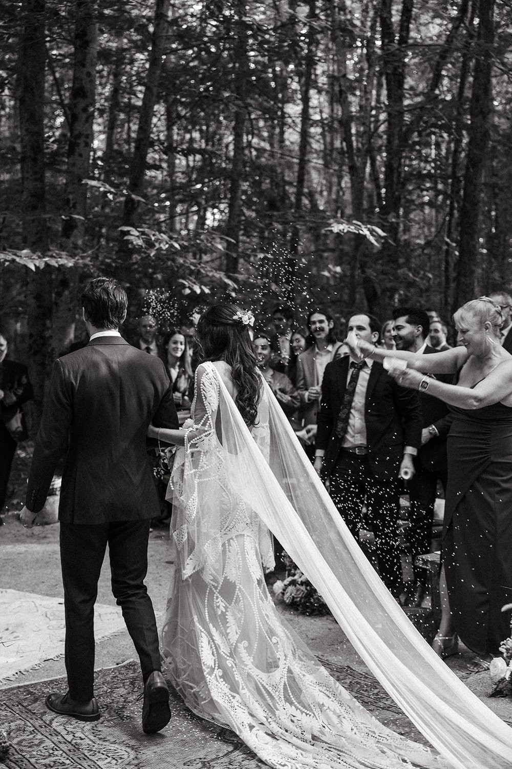 Stunning bride and groom exit their dreamy wedding ceremony