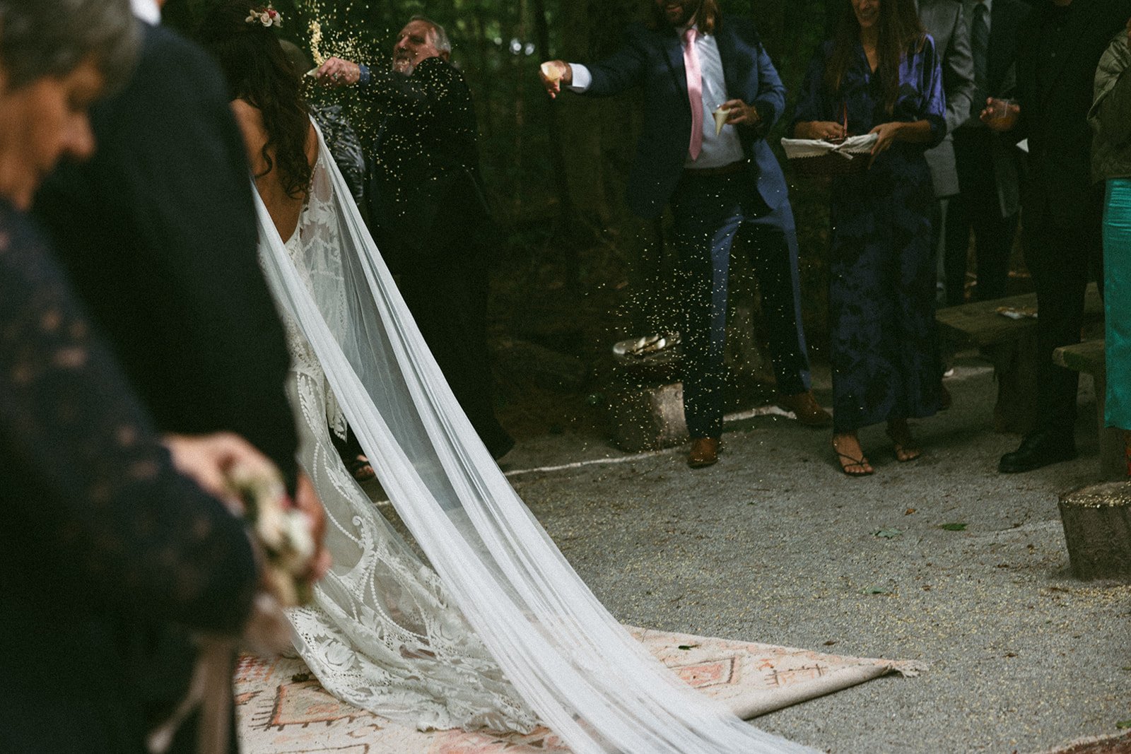 Detail shot of a brides veil as they exit their dreamy wedding day 