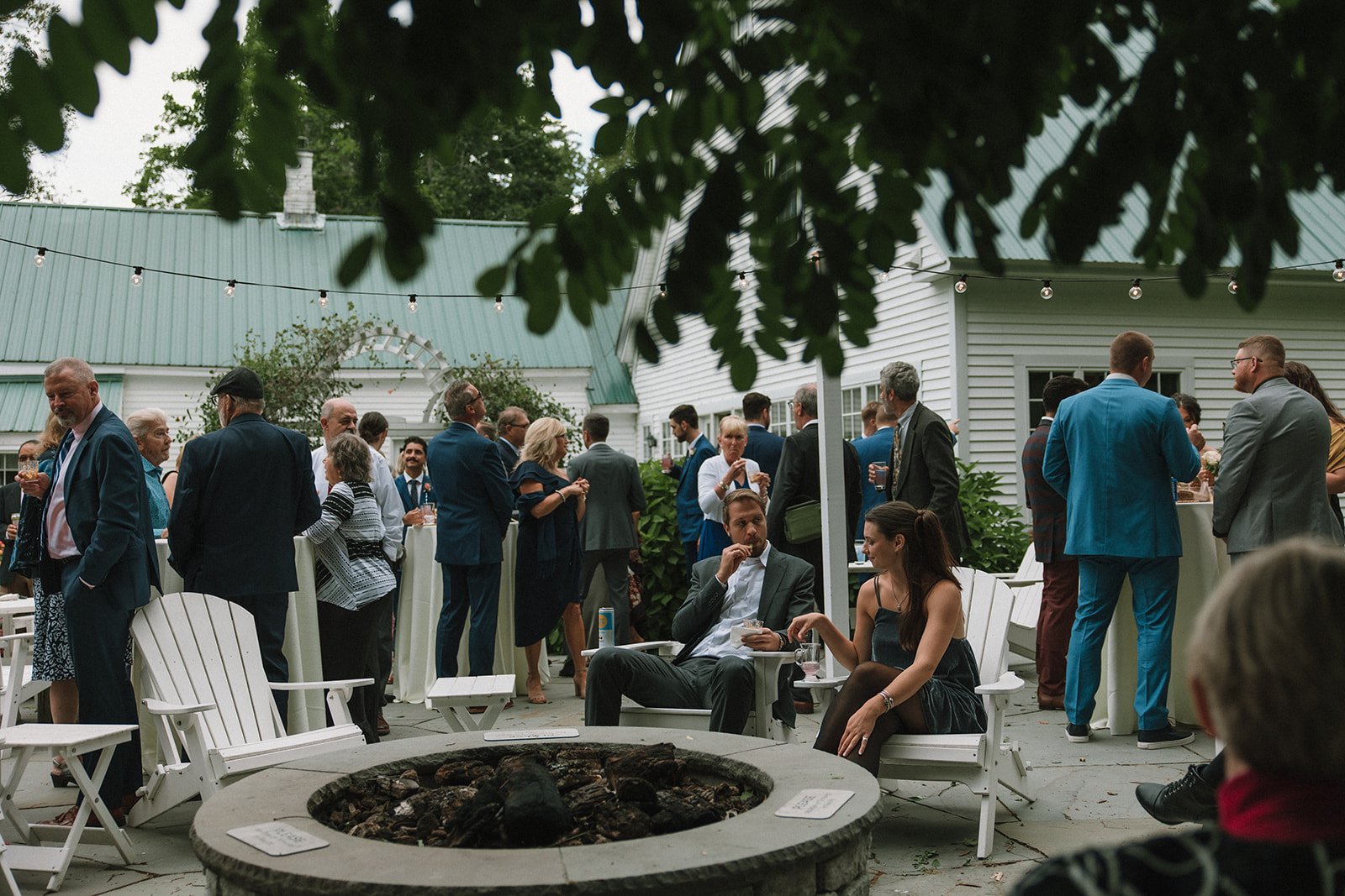 Guests mingle during cocktail hour of a dreamy wedding day