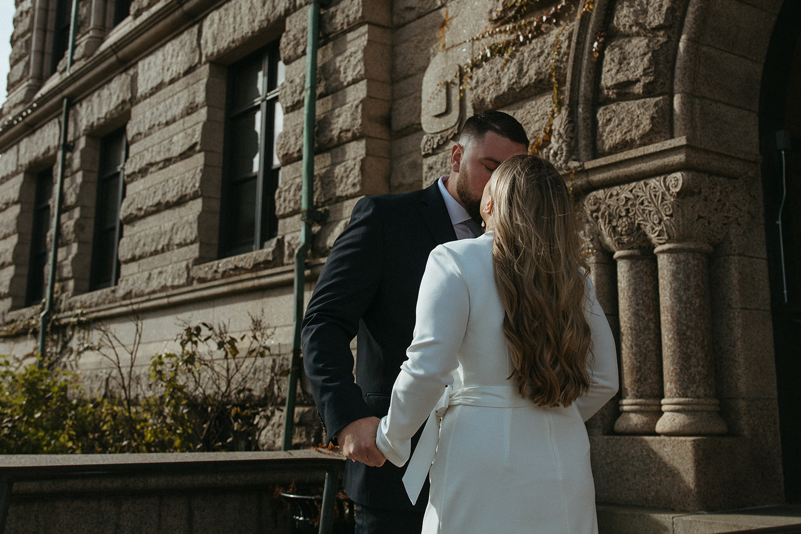 Stunning bride and groom share a kiss after eloping in Massachusetts