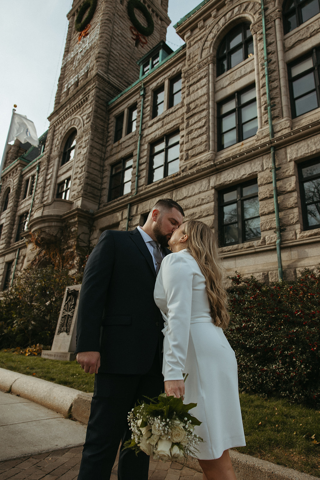 Stunning bride and groom share a kiss after eloping in Massachusetts