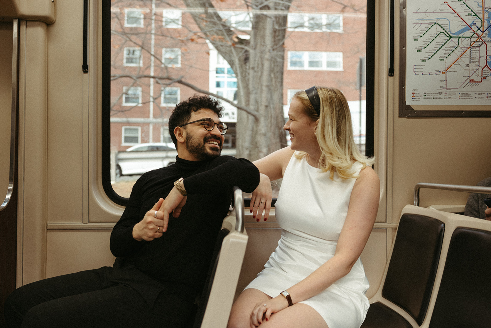 Stunning couple pose with Boston subway in the background