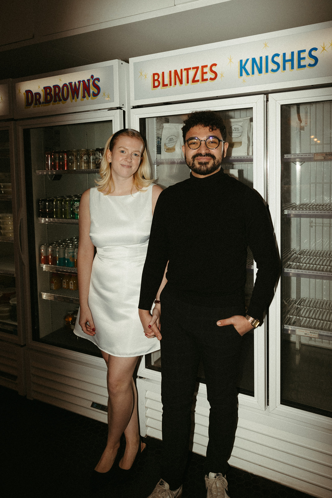 Stunning couple pose in a Boston diner together during their engagement photos in Boston!