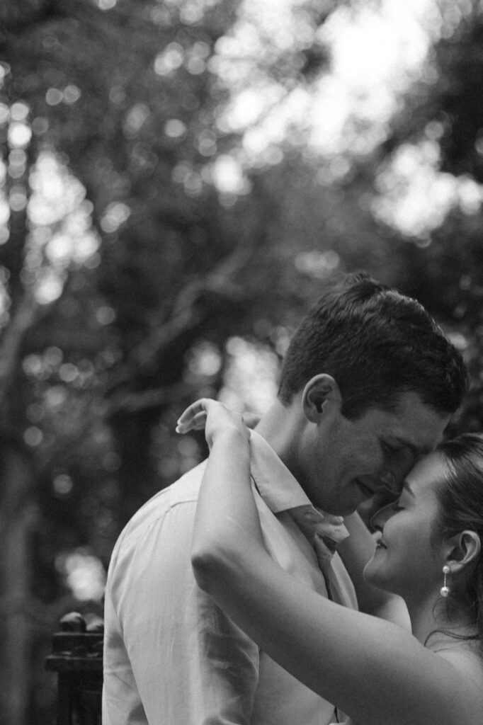 couple poses for engagement photos in boston