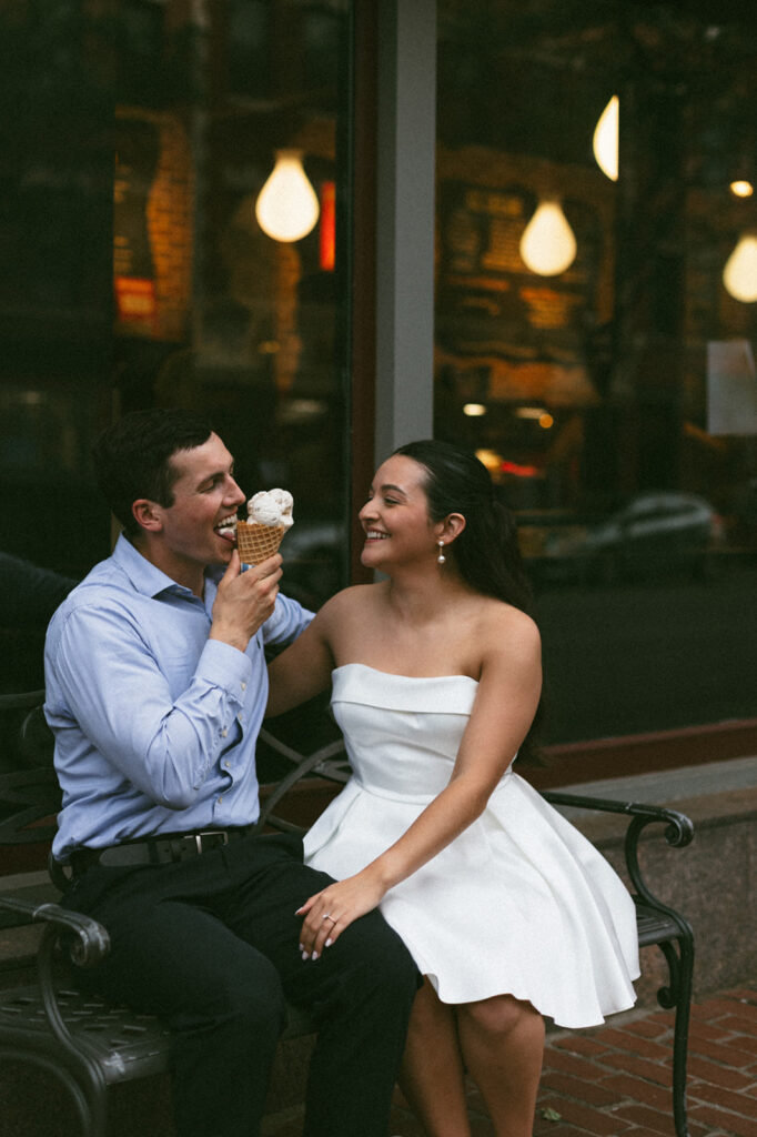 couple eats ice cream cone at JP licks during summer engagement session in Beacon Hill