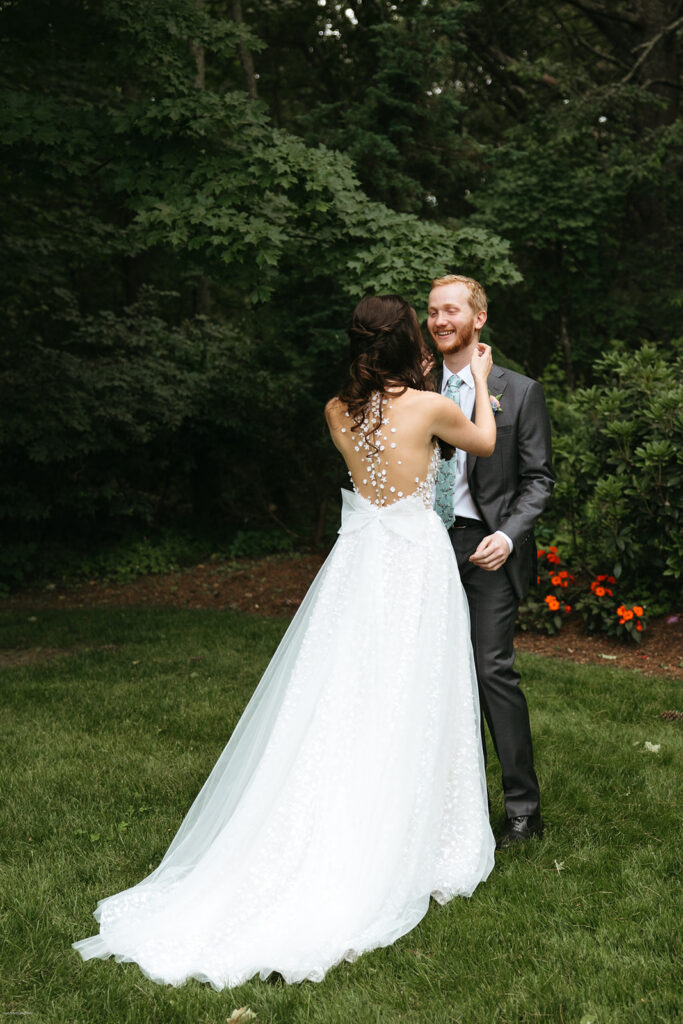 bride and groom first look at Bedford Village Inn New Hampshire wedding