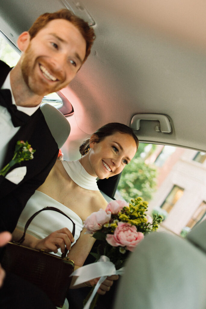 Film Inspired Photography Bride and Groom ride in car to Reception