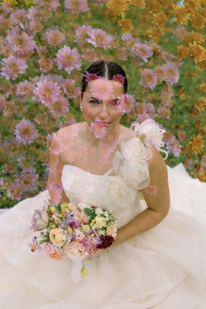 a creative wedding photo of bride during fall wedding in new hampshire