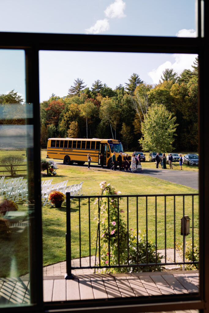 school bus drops off wedding guests at wedding ceremony
