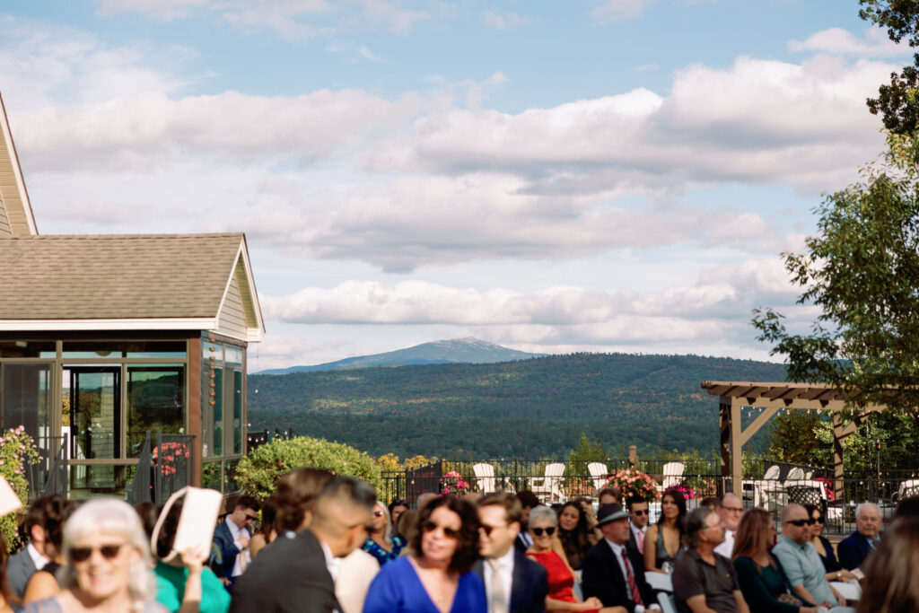 views of mount washington in the background of this new hampshire backyard wedding ceremony