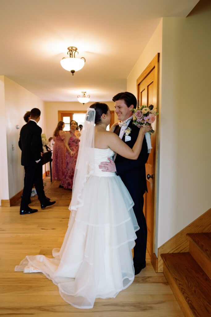 bride and groom emotional embrace after wedding ceremony