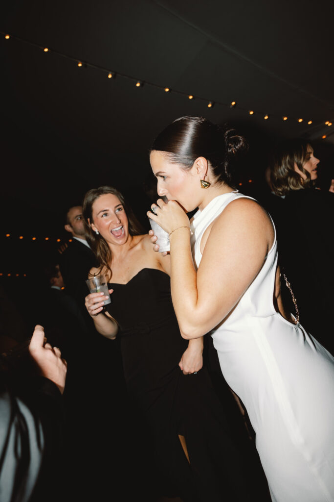bride dancing with friends