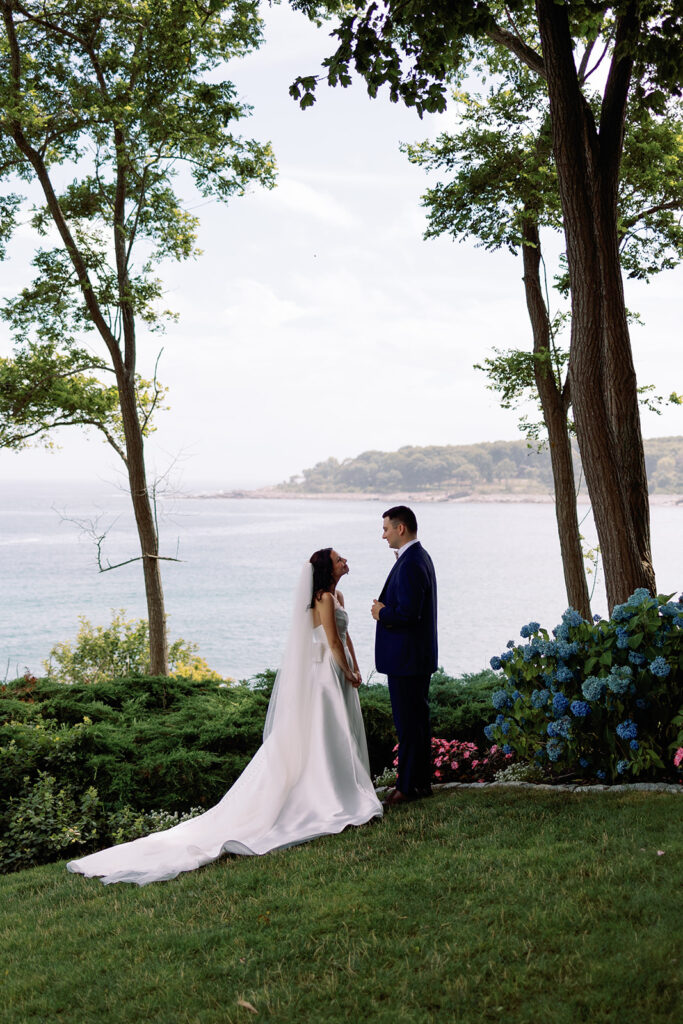 bride and groom first look in York Maine harbor 