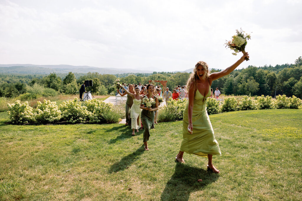 candid post-ceremony photo of bridesmaids wearing chartreuse dresses