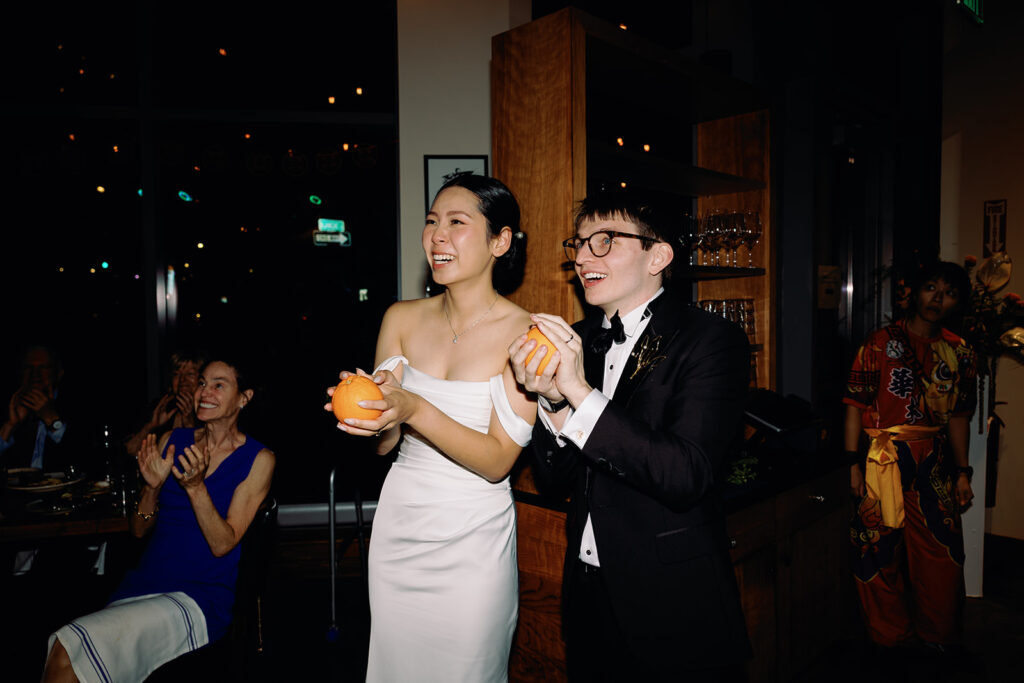 bride and groom interact with lion dancers at PAGU wedding 