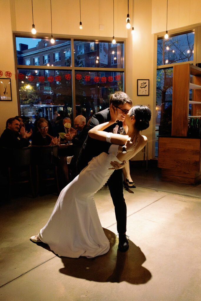 bride and groom share first dance at restaurant wedding at PAGU in Cambridge MA