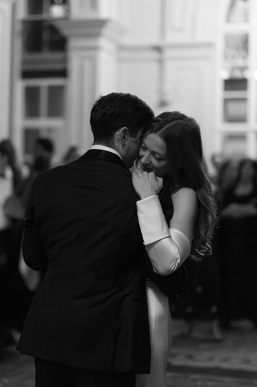 the bride and groom dancing at their boston athenaeum wedding