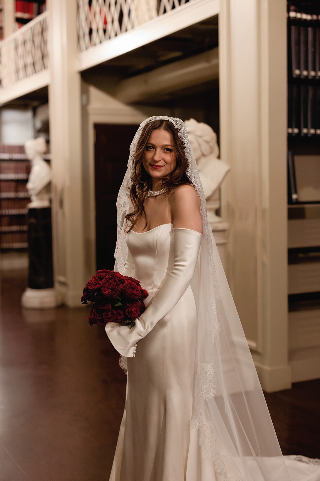 the brides outfit at a ​boston athenaeum weddings