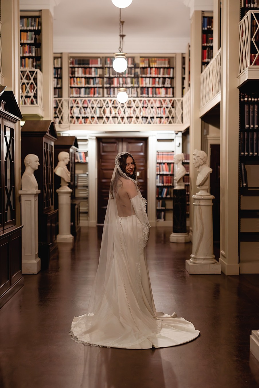 the brides outfit at a ​boston athenaeum weddings