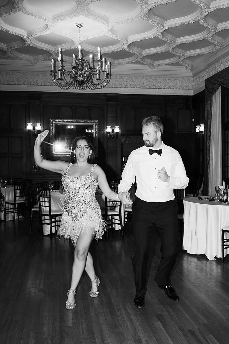 the bride and groom dancing in ​the mansion on turner hill wedding reception space