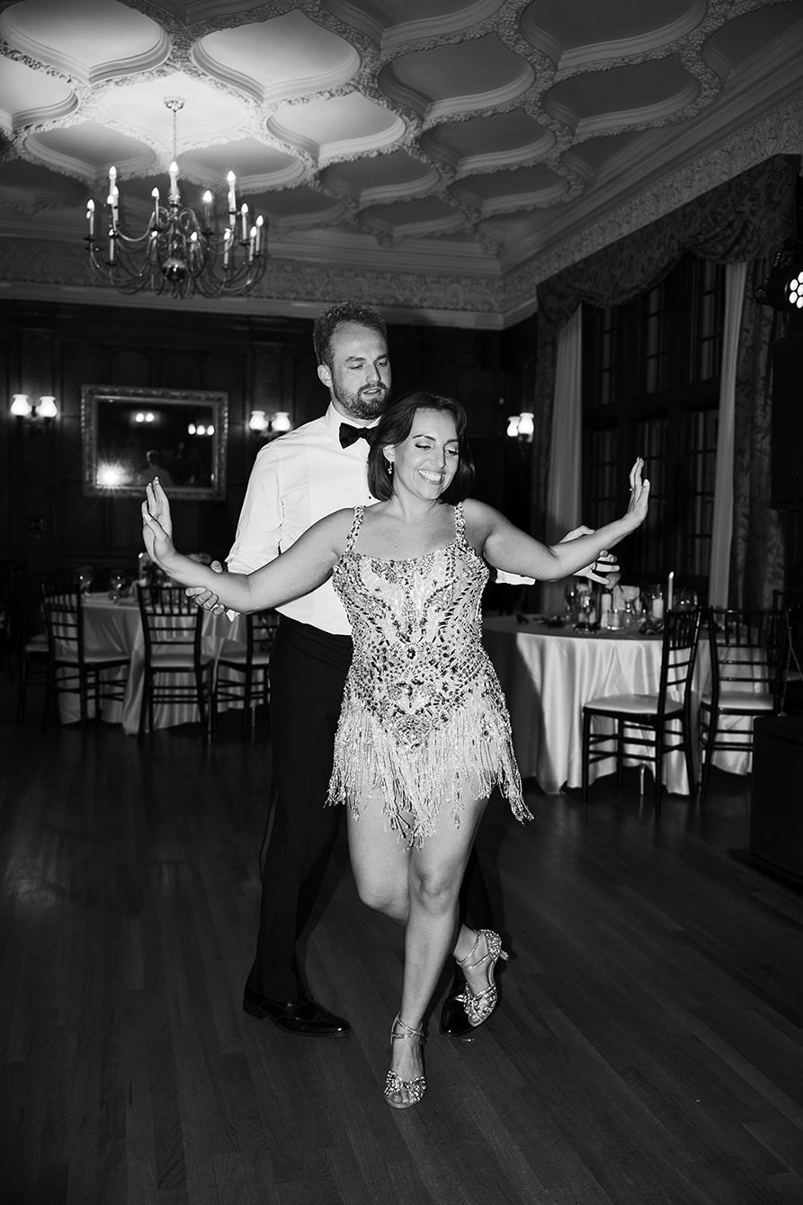 the bride and groom dancing in ​the mansion on turner hill wedding reception space
