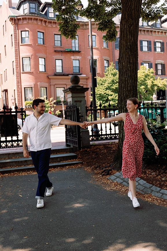 a couple taking their boston common engagement photos