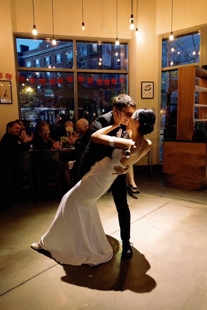 the bride and groom dancing at their boston restaurant wedding venues