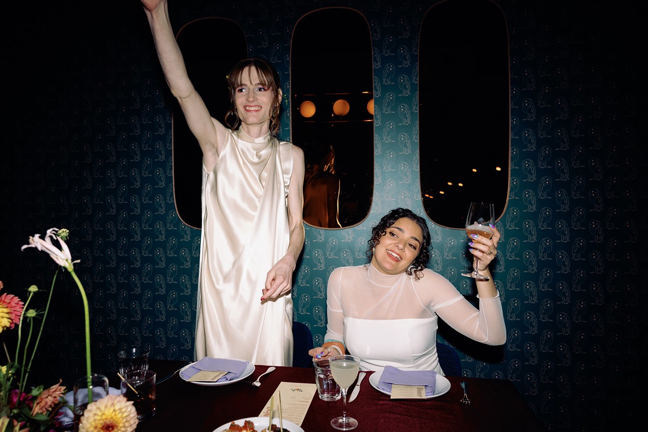 the brides toasting at a wedding dinner venues in boston