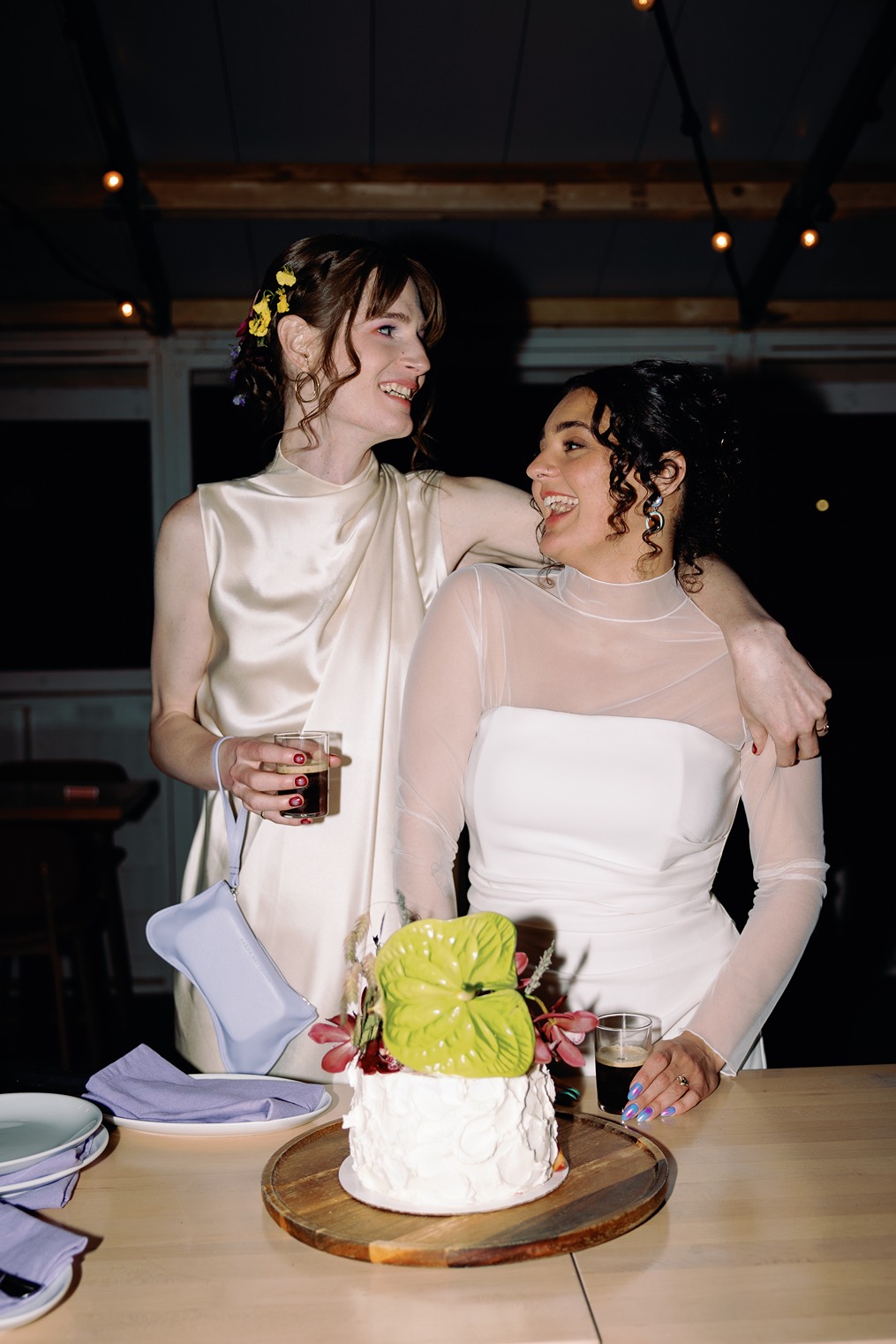the brides with their cake at a wedding dinner venues in boston