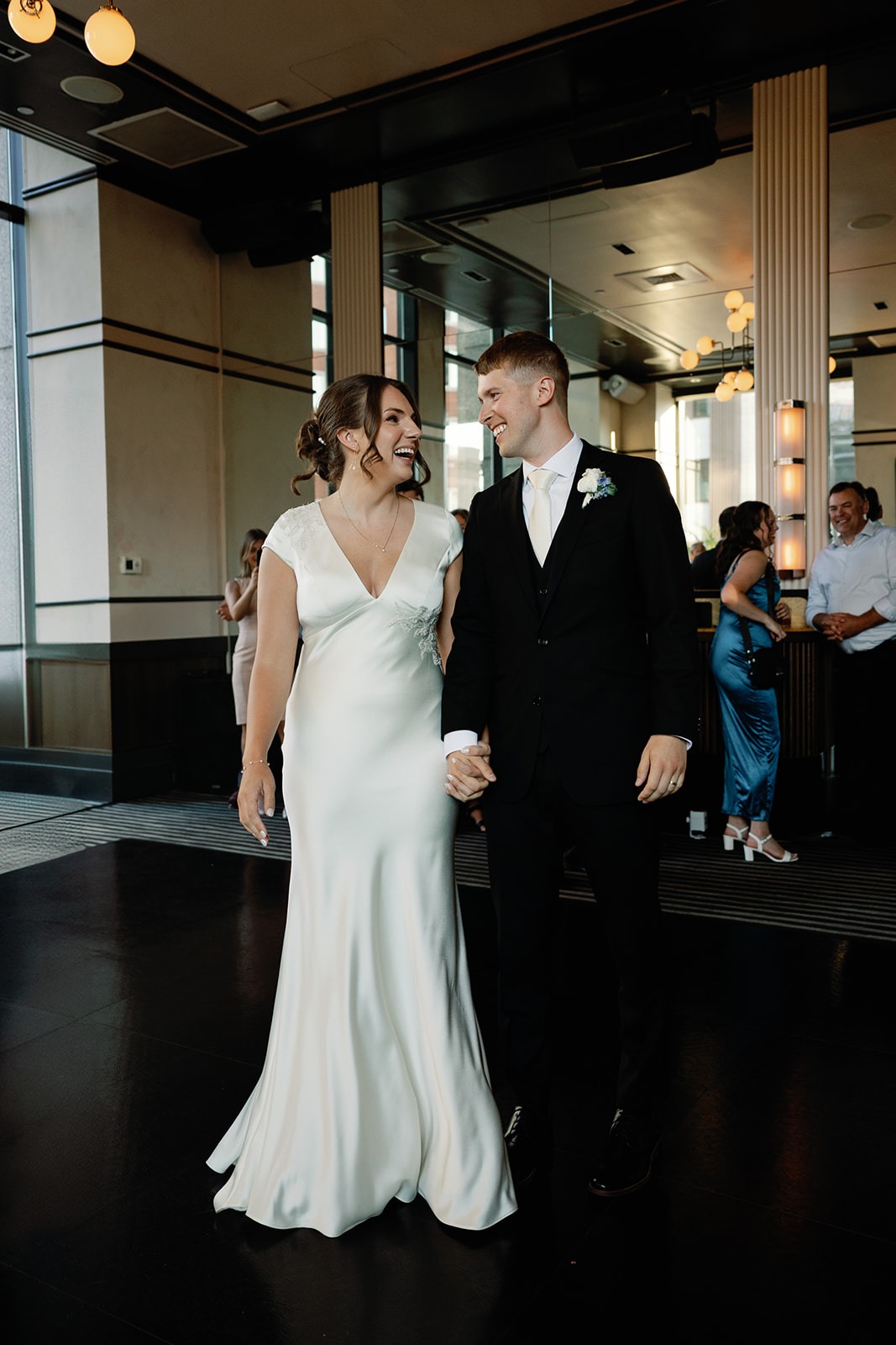 the couple inside a restaurant wedding venues boston couples love
