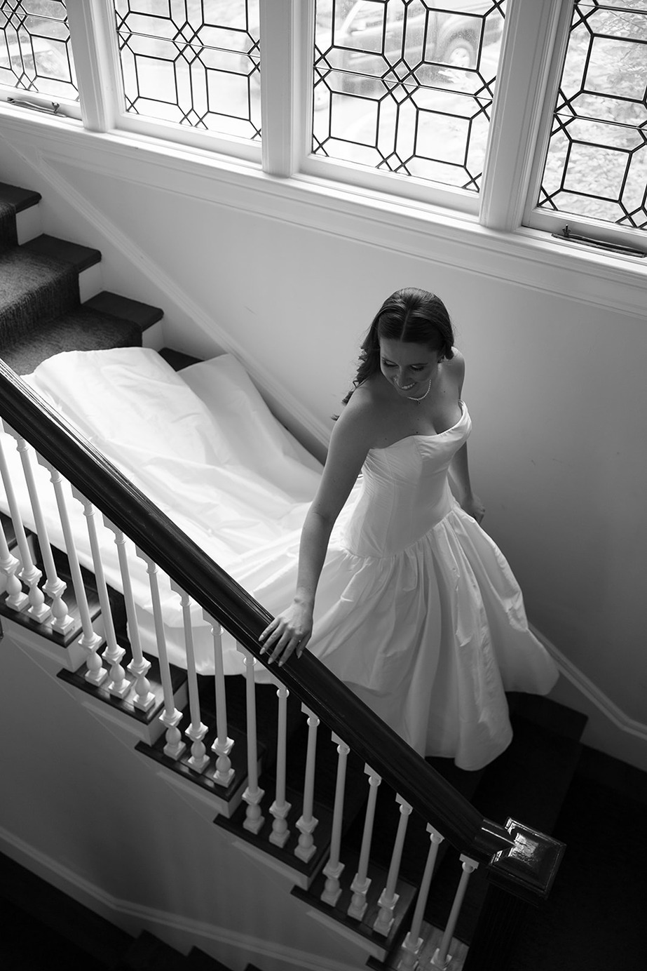 walking down the stairs before ​mass horticultural society gardens at elm bank wedding