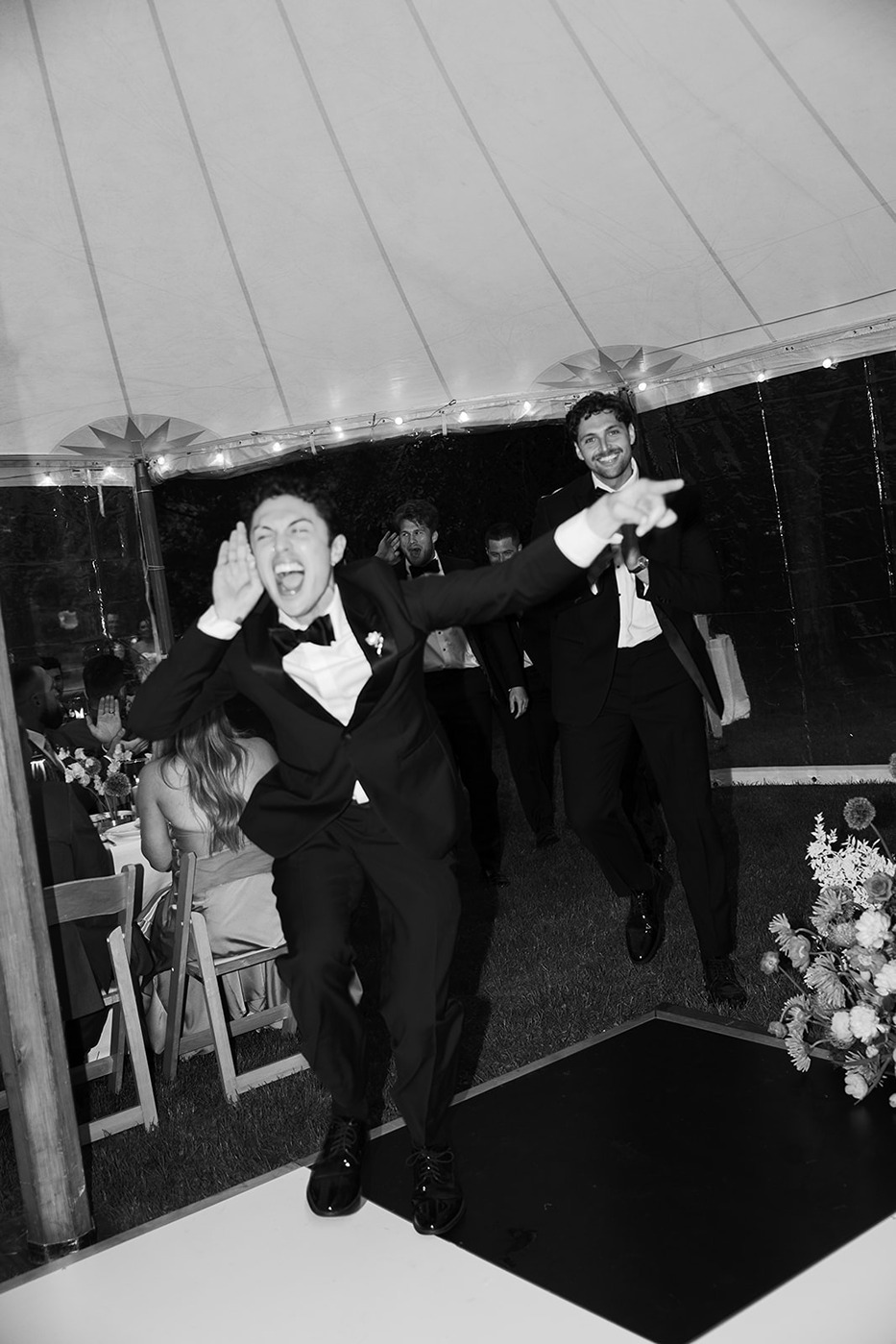a groomsmen at a garden at elm bank wedding
