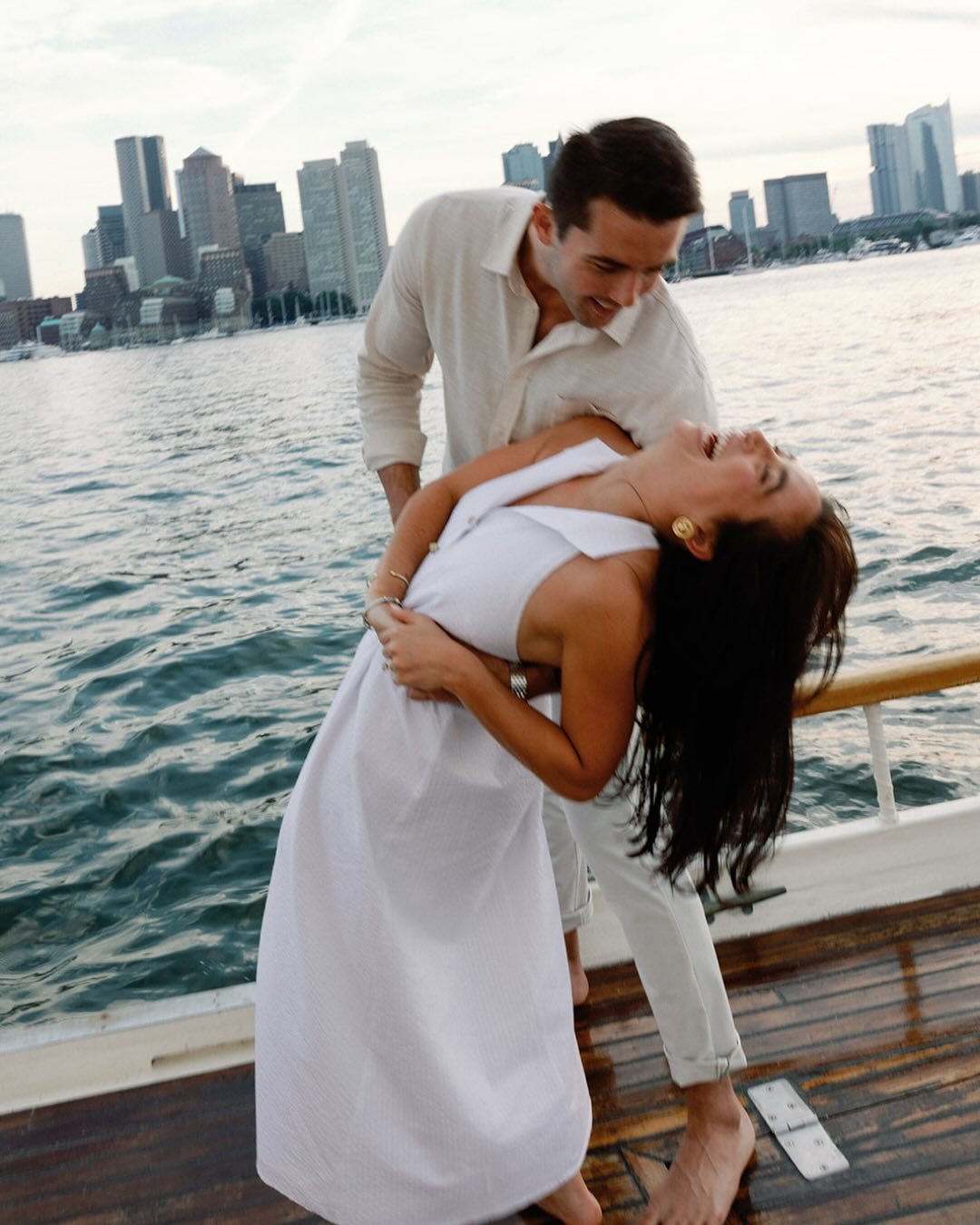 a couple boating in boston harbor